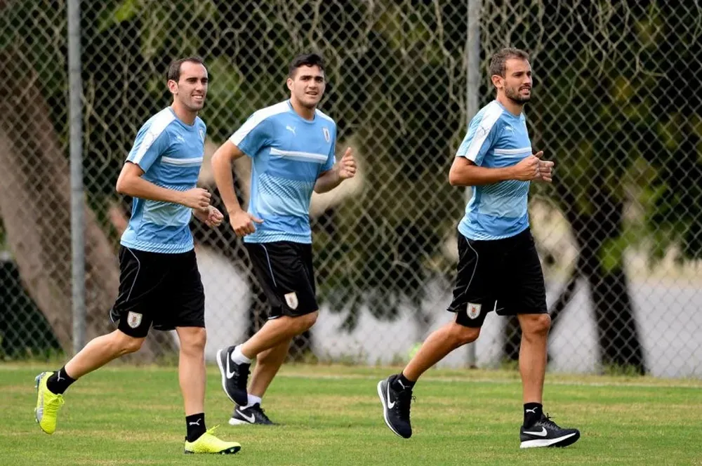 Godín, Gómez y Stuani