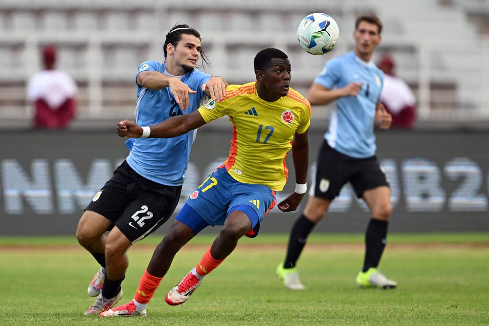 Bruno Calcagno de Uruguay ante Juan Arizala de Colombia
