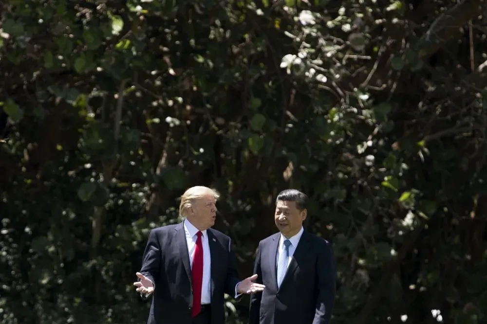 El presidente de Estados Unidos, Donald Trump, junto a su homólogo de China, Xi Jinping
