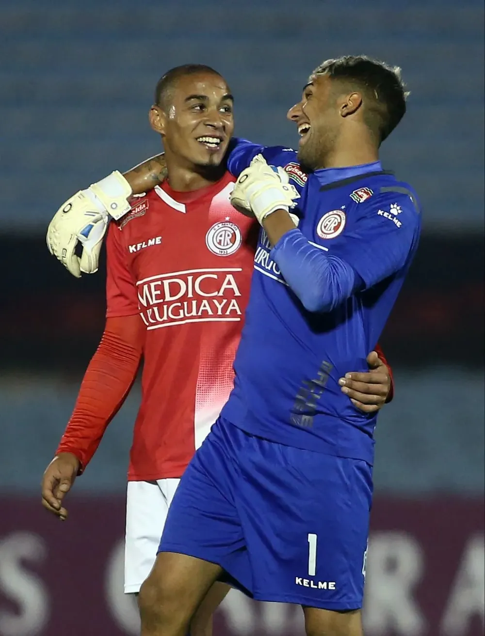 González y Rossi felices sobre el final