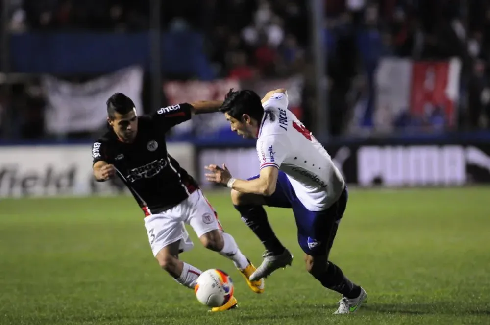 Martín Alaniz y Jorge Fucile