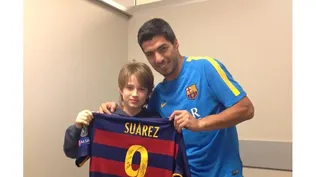Suárez con Lucas, el hijo de Iván Alonso