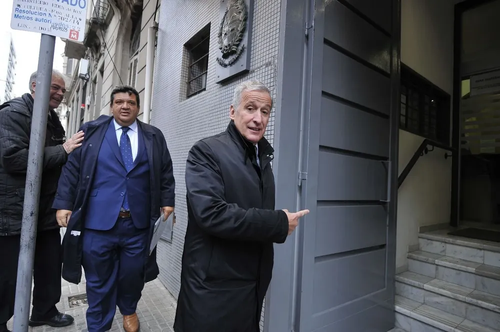 Juan Pedro Damiani ingresa al juzgado con el abogado Jorge Barrera