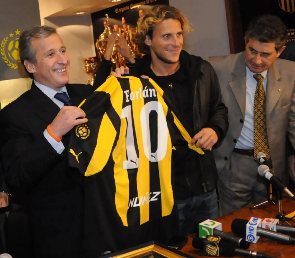 Juan Pedro Damiani, Diego Forlán y Fernando Morena