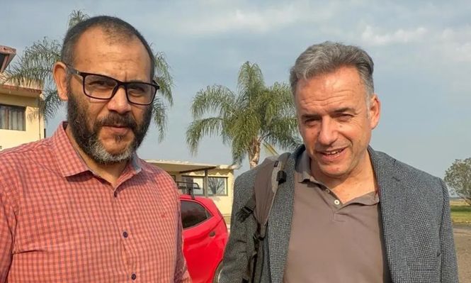 Eugenio Acosto junto al presidente Orsi