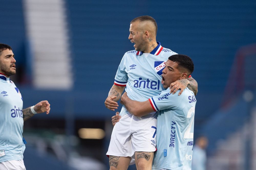 Maximiliano Gómez, Nicolás López y Diego Romero