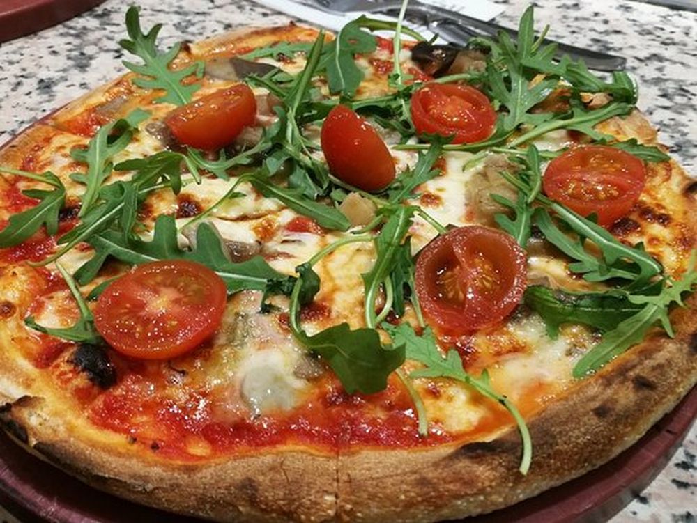 Uno de los mejores placeres del lugar hecho pizza.