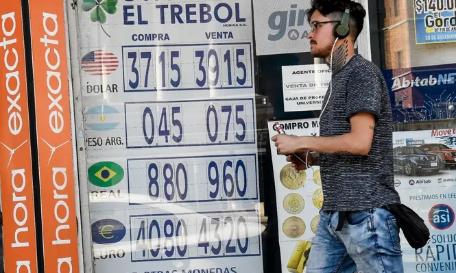 Dólar sube y se ofrece arriba de $ 39 en la venta de los cambios