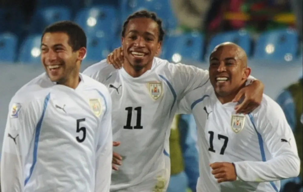 Walter Gargano, Álvaro Pereira y Egidio Arévalo Ríos en el Mundial 2010