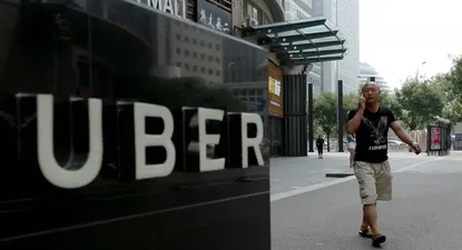 La filial de Uber en China se fusiona con su competidor local