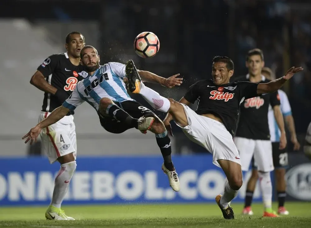 Lisandro López de Racing y Salustiano Candia de Libertad