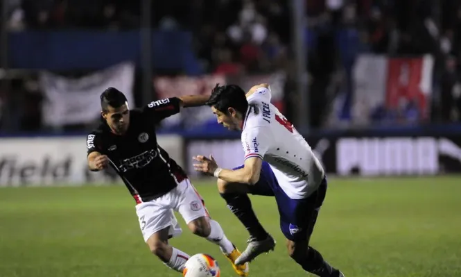 Martín Alaniz y Jorge Fucile