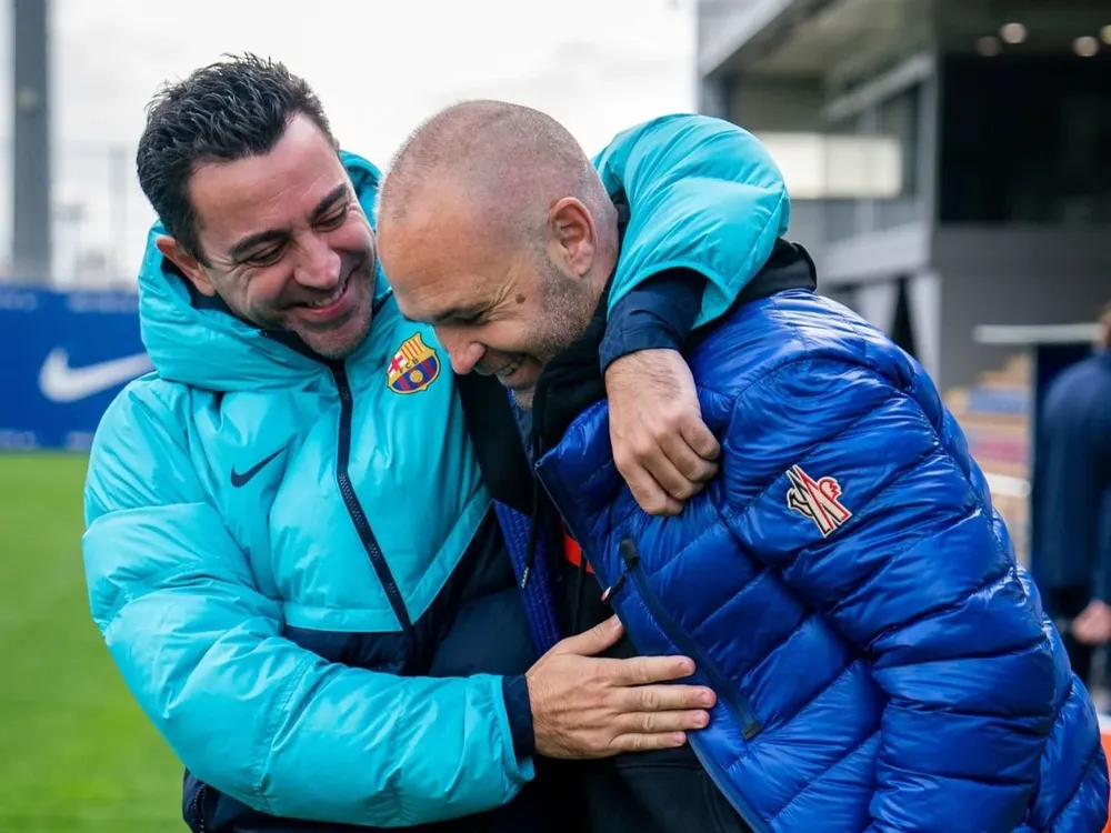 Iniesta y Xavi.