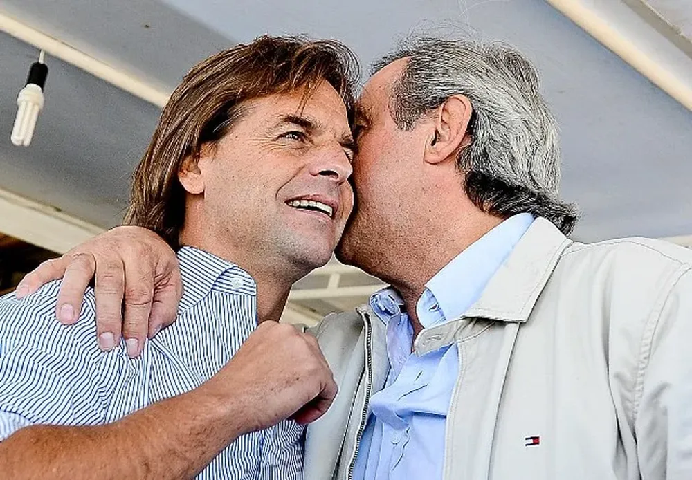 Sábado 22. Los precandidatos nacionalistas Luis Lacalle Pou y Jorge Larrañaga en la muestra Expoactiva.