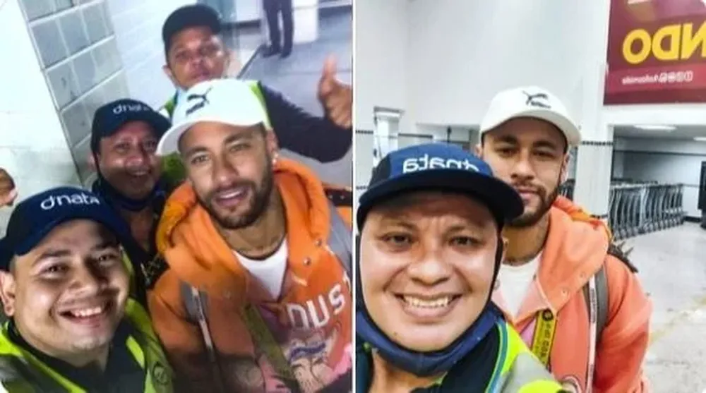 Neymar con los funcionarios del aeropuerto de Roraima tras el aterrizaje de emergencia en