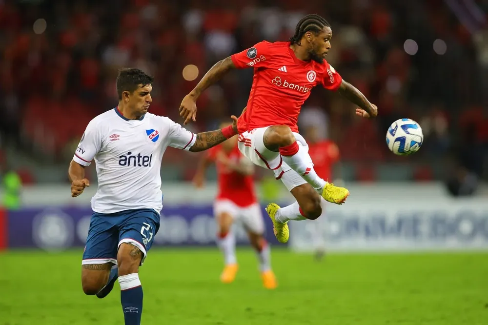 Diego Polenta y Luiz Adriano