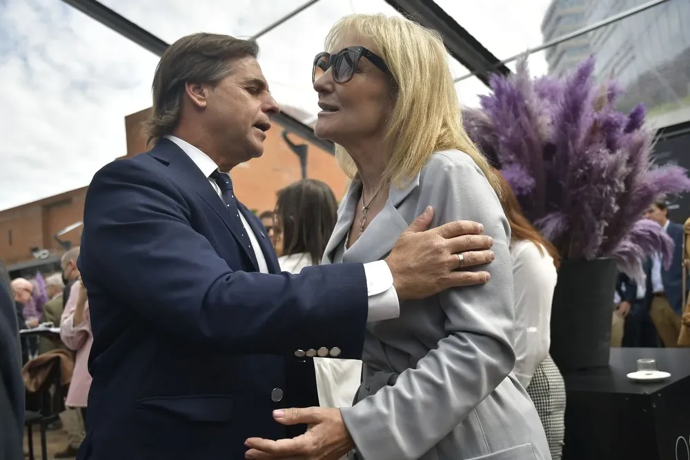 Luis Lacalle Pou y Carolina Cosse