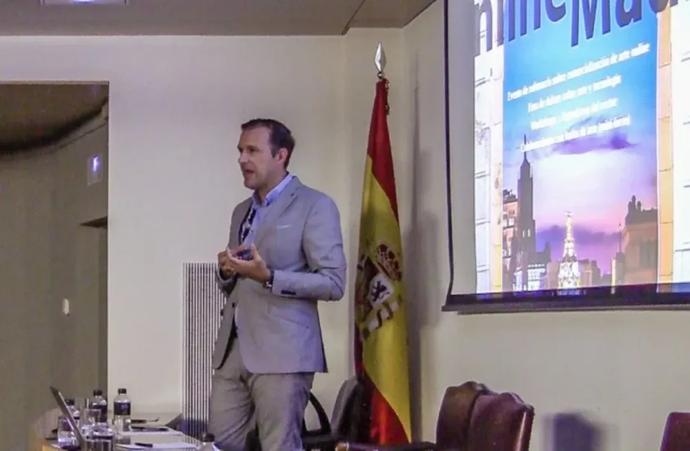 Juan Antonio Rodríguez en la disertación de un evento de The Art Market