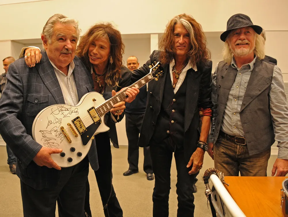 Aerosmith con José Mujica en su visita a Uruguay en 2013