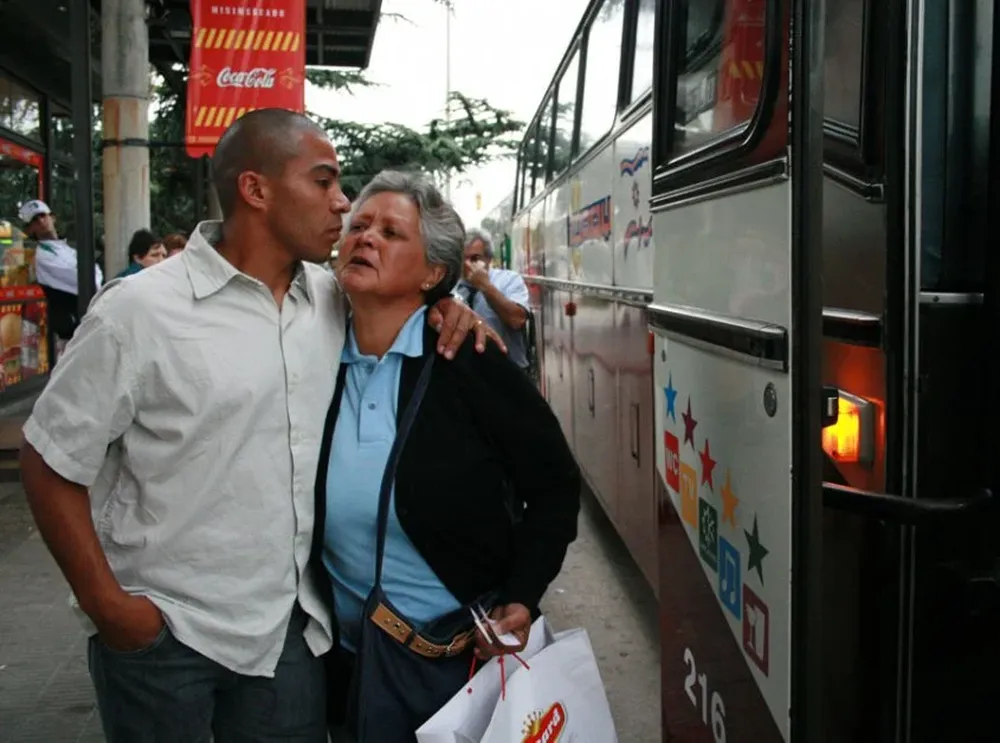 Con su madre, cuando aún peleaba por un lugar en la selección
