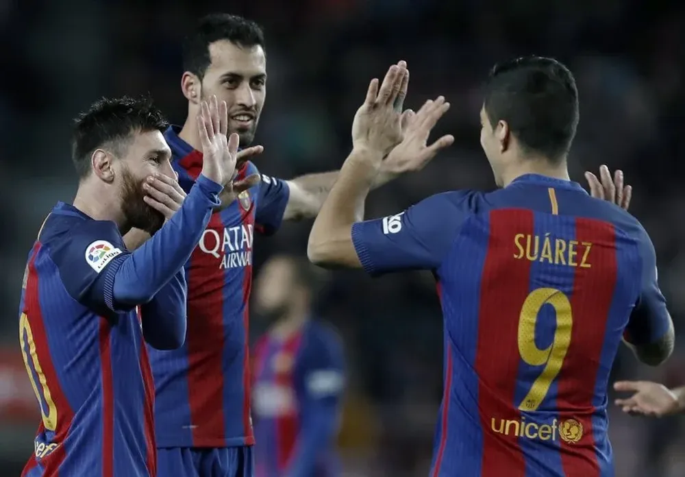 Lionel Messi, Sergio Busquets y Luis Suárez