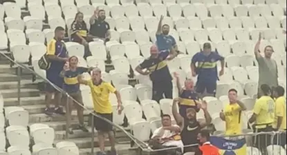 El hincha de Boca detenido en el centro de la imagen