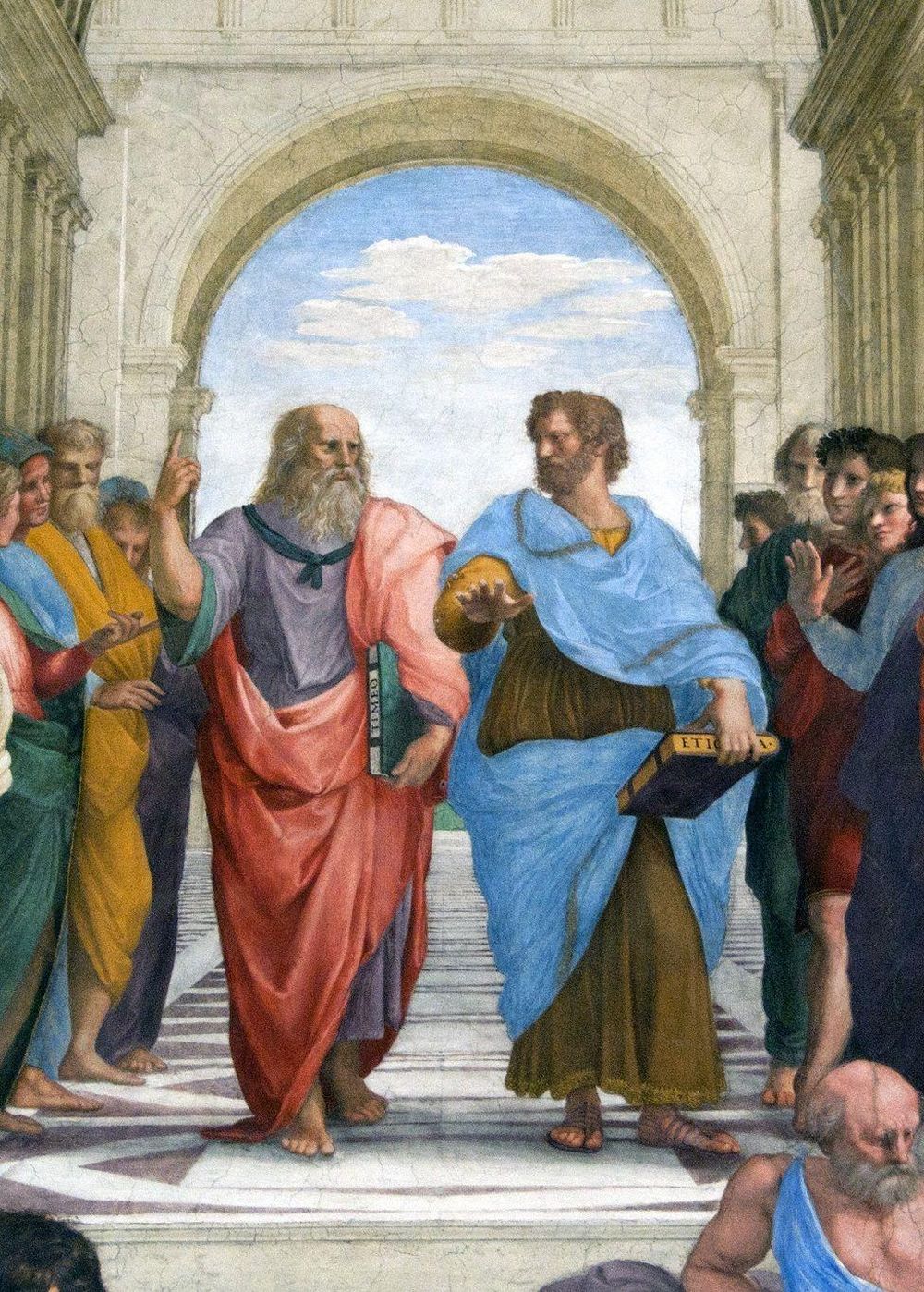 Detalle de la obra “La escuela de Atenas” de Rafael en el que se observa en el centro a Platón, de rojo, y Aristóteles, de azul.