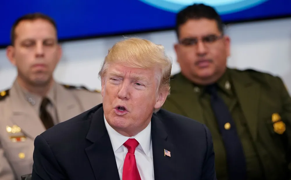 US President Donald Trump speaks during a meeting at the Customs and Border Protection National Targeting Center in Sterling, Virginia on February 2, 2018. / AFP