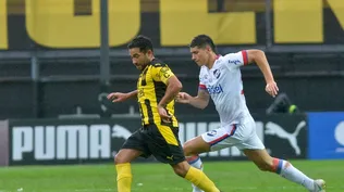 Walter Gargano y Emiliano Martínez, jugadores actuales de Peñarol y Nacional