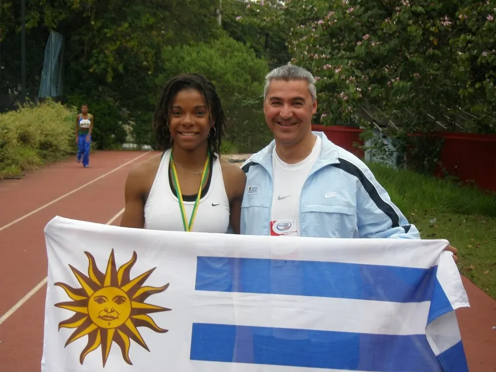 Déborah y su entrenador Barrios, una dupla ganadora