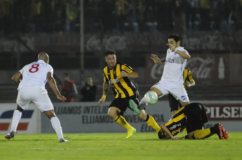 Cristian Rodríguez y Jorge Fucile
