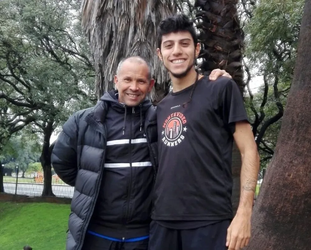 Mauricio Castillo (D) y su entrenador Patricio Melo