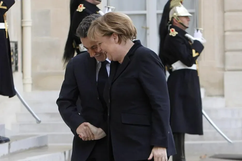 Sarkozy y Merkel