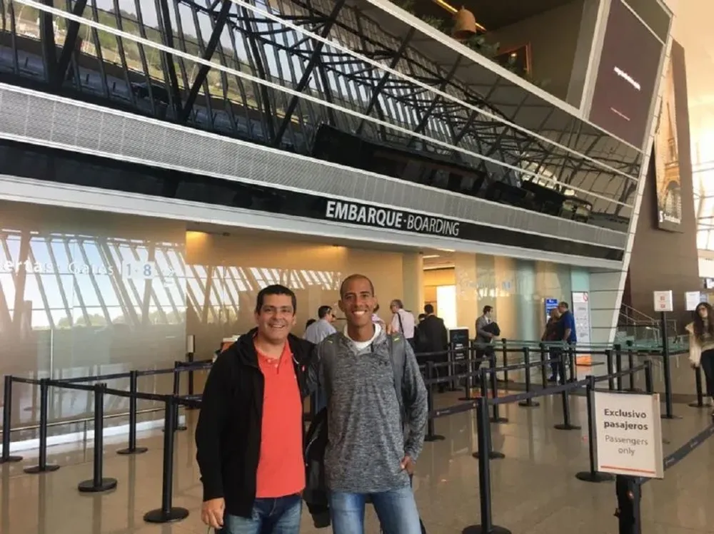 De Mello y Rojas en la despedida del atleta