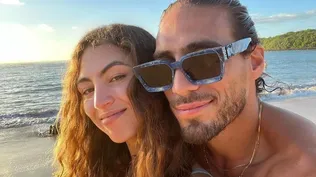 Martín Cáceres y su pareja