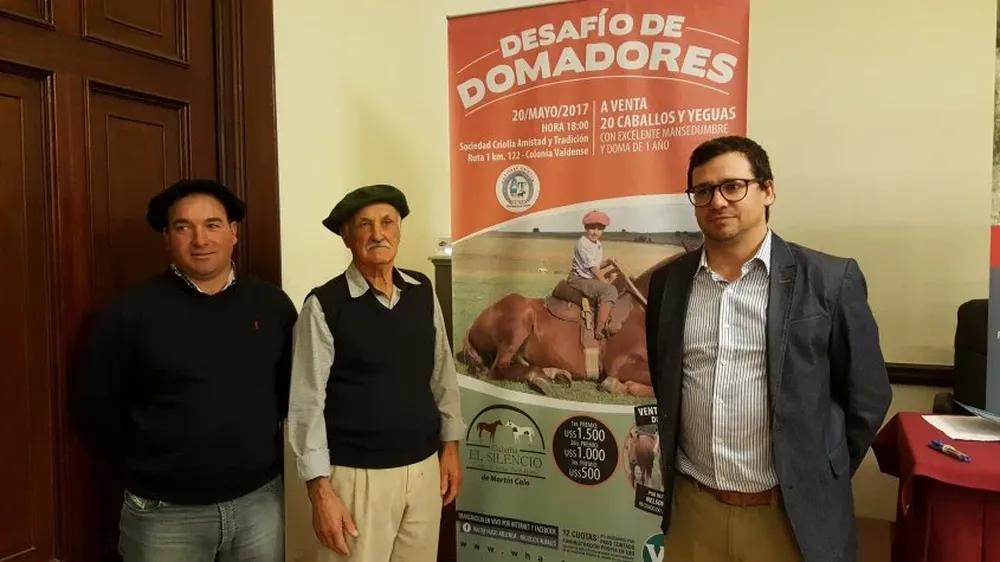 Martín Calo y Luis Marfut con el rematador Joaquín Abelenda