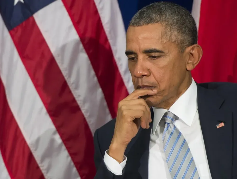 US President Barack Obama speaks during a bilateral meeting with Canadian Prime Minister Justin Trudeau (not pictured) on the sidelines of the Asia-Pacific Economic Cooperation (APEC) Summit in Manila on November 19, 2015. Police and protesters clashed on November 19 outside the gathering of Asia-Pacific leaders who were meeting for a summit dominated by a US-China tussle for regional influence. AFP PHOTO / SAUL LOEB