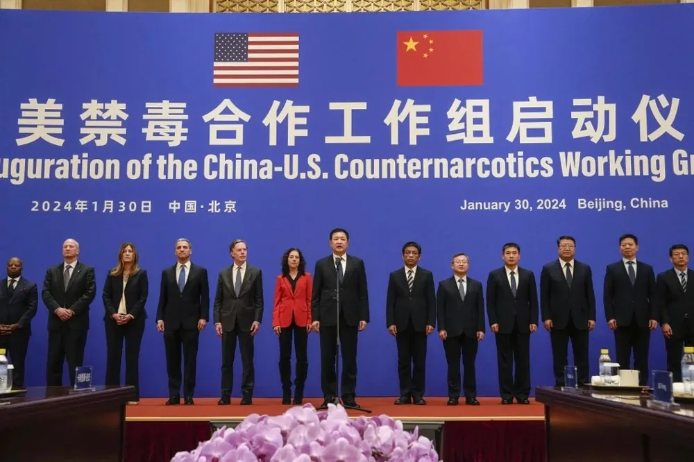 Los funcionarios chinos y norteamericanos que participan en la reunión antinarcóticos en Beijing.