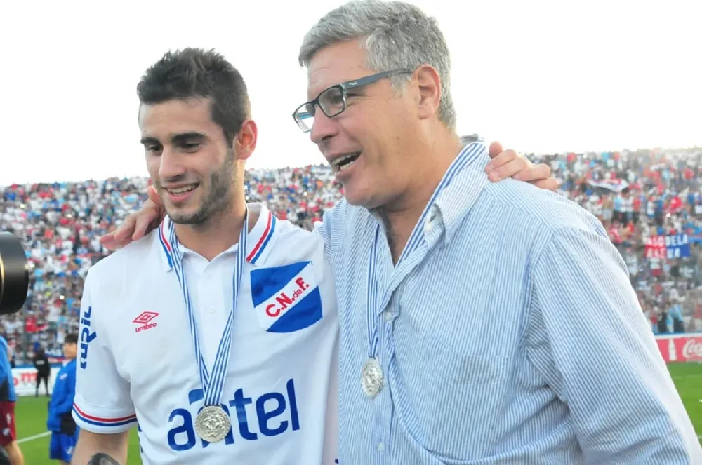 Pereiro y Gutiérrez en el festejo del Apertura 2014