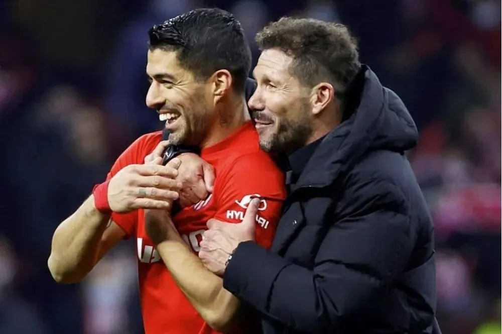Suárez y Simeone tras el partido contra Valencia