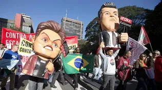 Brasil- Dos manifestantes disfrazados de la presidenta brasilera, Dilma Rousseff, y del diputado brasileño Marcos Feliciano