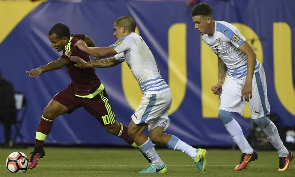 Rómulo Otero y Maximiliano Pereira