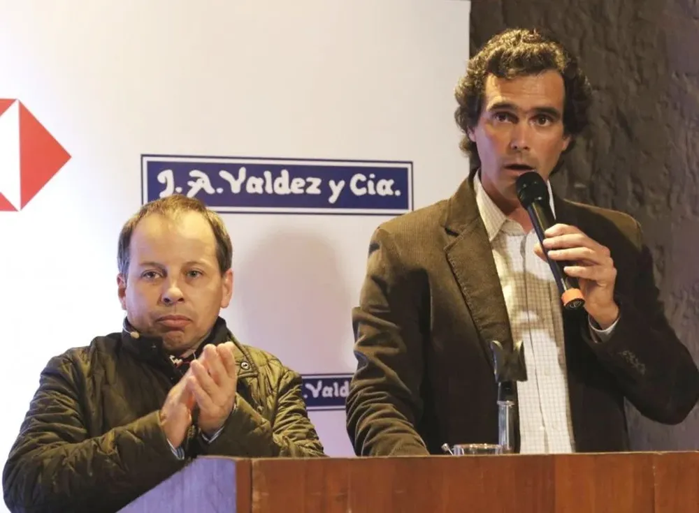 Pablo Valdez, director de Valdez y Cía, con el rematador Alejandro Núñez