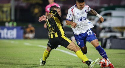 Jesús Trindade de Peñarol ante Julián Millán de Nacional