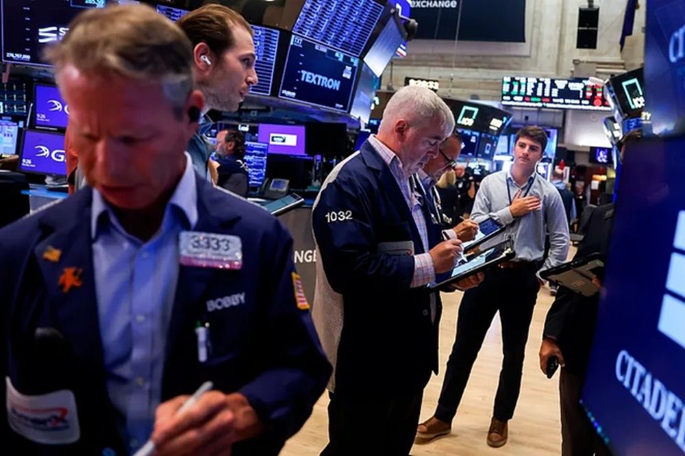 Traders en la Bolsa de Nueva York. EXPANSION