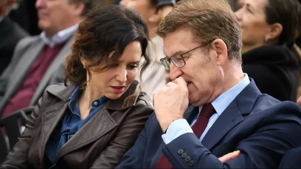 a presidenta de la Comunidad de Madrid, Isabel Díaz Ayuso, y el líder del PP, Alberto Núñez Feijóo