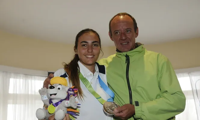 Dolores Moreira y su entrenador Luis Chaparro