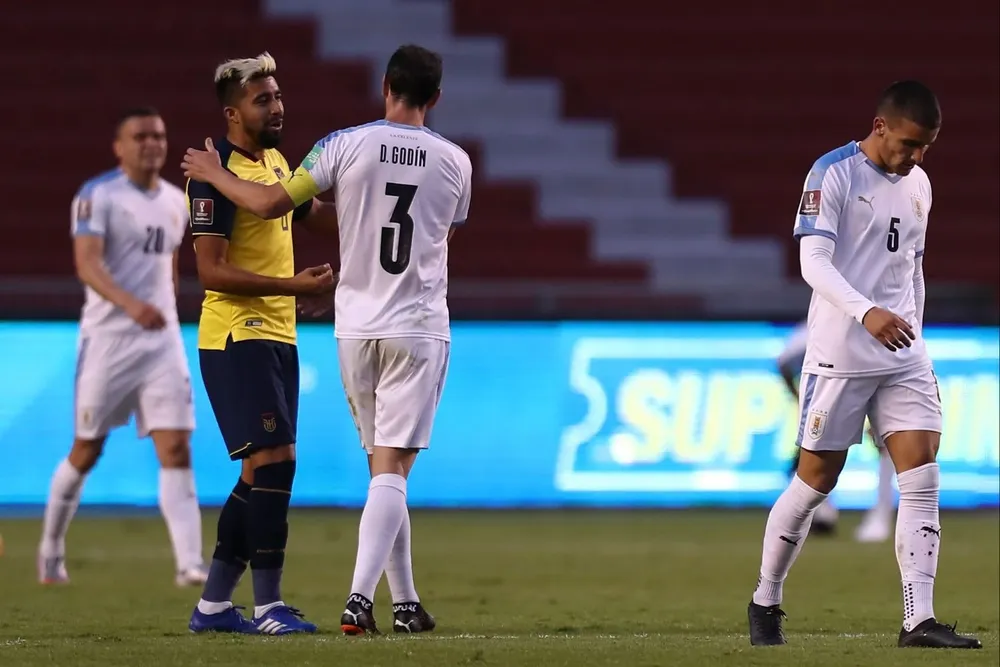 Diego Godín y Christian Noboa