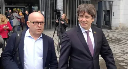 El abogado Gonzalo Boye y Carles Puigdemont.