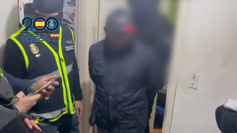 El yihadista detenido por amenazar con atentar contra la Embajada de Ecuador, según las imágenes divulgadas por la Policía Nacional de España